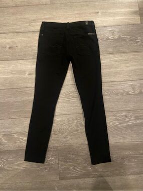 Black high-waisted skinny jeans in a size 26" #denim #highwaisted